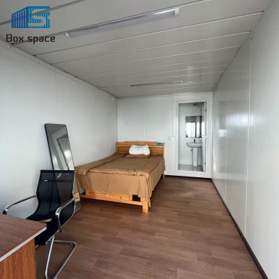 China Boxspace 20Ft Contenedor de paquete plano Casa pequeña 2 pisos Unidad de dormitorio prefabricado Contenedor de paquete plano en venta