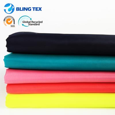 China Wholesale High Quality Bright Colors Taffeta Fabric Lining Poliester Taffeta 100 Polyester Fabric Shrink-Resistant for sale