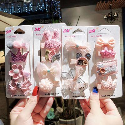 China 2020 popular best selling pink candy and star fabric baby clip hairs for sale