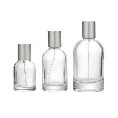 China Hot Sale 100ml Cylinder Shape Glass Cosmetic Perfume Bottle With Aluminum Sprayer for sale