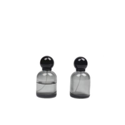 China 2023 Cosmetic Transparent Black Color Glass Empty Perfume Bottle With Boxes for sale