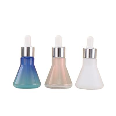 China Promotion cosmetic dropper glass bottle subuliform shaped essential oil bottle with dropper for sale