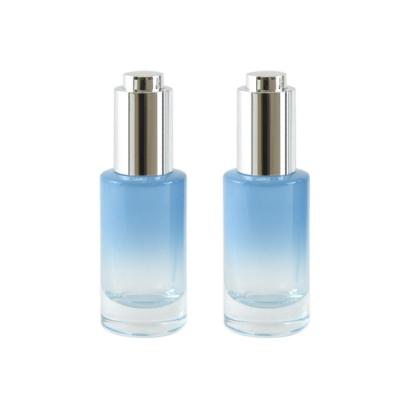 China Wholesale Cosmetic Transparent Blue Color Packaging Serum Glass Bottle With Dropper for sale