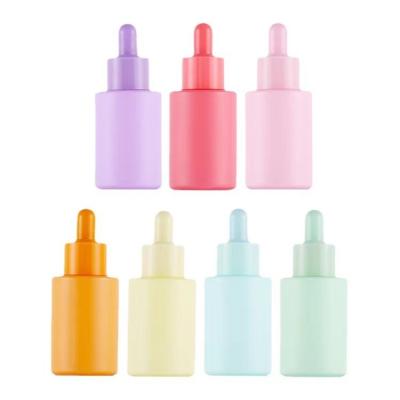 China Selling Cosmetic Luxury Pink Whole Cylinder Shape Glass Dropper Bottle With Colorful Lid for sale