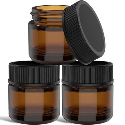 China Cosmetic Durable Amber Glass Cream Jar Glass Cosmetic Jar With Black Plastic Lid for sale