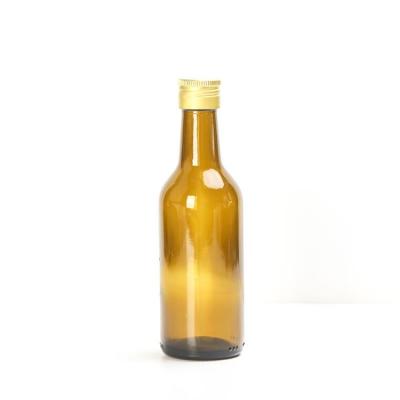 China Empty Beverage Mini Amber Color 50ml 100ml 200ml Wine Liquor Glass Bottles for sale