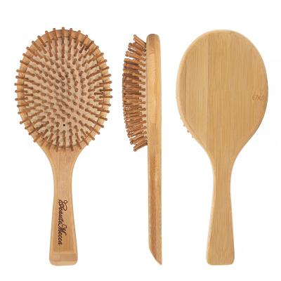 China Eco-Friendly Rubber Paddle Brush Bristle Bamboo Hair Brush for Men and Women for sale