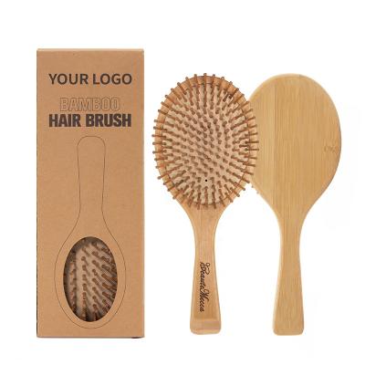 China Biodegradable Bamboo Paddle Paddle Brush Natural Rubber Cushion Hair Detangling Brush for sale