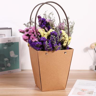 China Recyclable In Stock Flower Bag Carrier Paper Bag Mini Succulent Packing Paper Flower Packaging Bag for sale