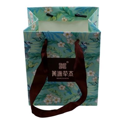 China Recycled Materials Wholesale Custom Strong Luxury Texture Printed Paper Shopping Bag For Gift And Shopping for sale