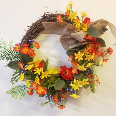 China Wholesale Eco-friendly Spring Flower Decoration Door Braids Yarn Wreath Frames Yellow Artificial Flower Cheap Wreath for sale