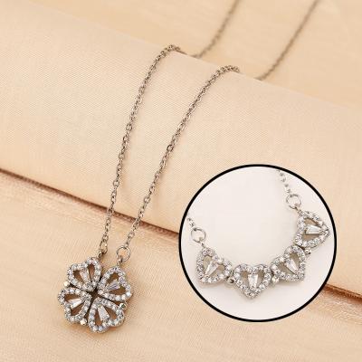 China High Quality Four/Two-way Heart Shaped Leaf Clover Wearing Pendant Necklace Silver Ice Out Magnetic Cubic Zircon Charm Necklace for sale