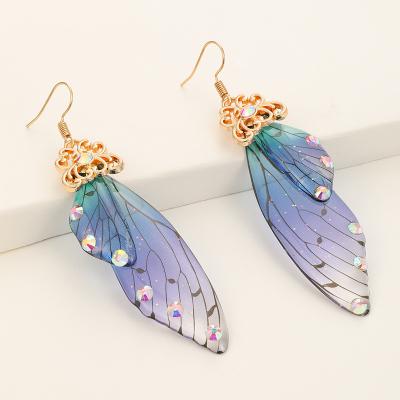 China FASHIONABLE 2021 popular luxury simple long bead animal butterfly wings tassel women girls earrings for sale