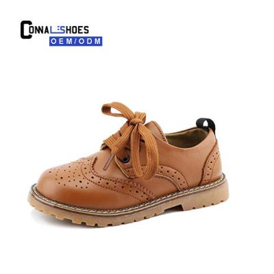 China Connal Fashion Style Breathable Boys Brown Brogues Flat Shoes Genuine Leather for sale