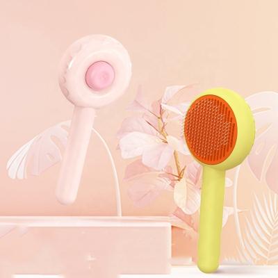 China Stored Donut Pet Hair Remove Needle Comb Pet Self Cleaning Cat Grooming Brush Comb for sale