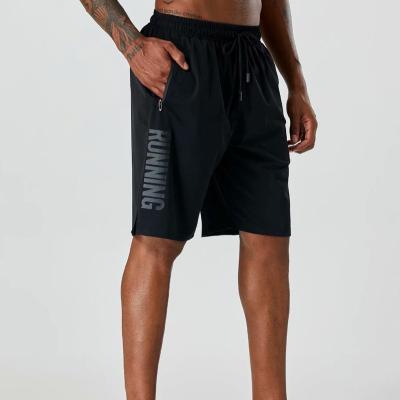 China Custom Logo Sports Apparel Elastic Waist Breathable Quick Dry Training Men's Running Shorts With Pockets for sale