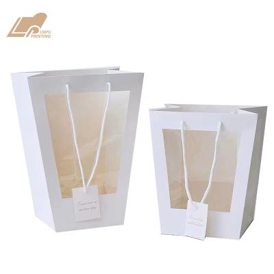 China New Materials Gift Packaging Bag Wholesale Flower Recycled Open Window Trapezoidal Transparent Paper Bag for sale