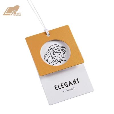 China Sustainable Garment Tags Cardboard Swing Hang Tags With Custom Printing And Foil Stamping for sale