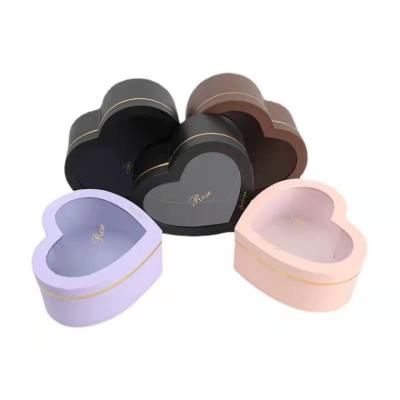 China 2022 wholesales luxury retail round cardboard tube ad recycled paper packaging materials box for cloth hat shoe for sale