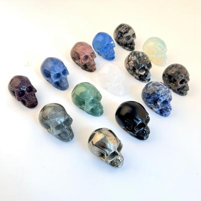 China China Wholesale Natural Hand Carved Crystal Skulls Head Quartz Crystal 2 inch for Fengshui for sale