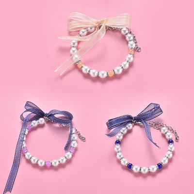 China Personalized Stylish Dog Collar Diamond Bow Fashion Necklace Beaded Pearl Cat Accessories Pet Products Supplier for sale