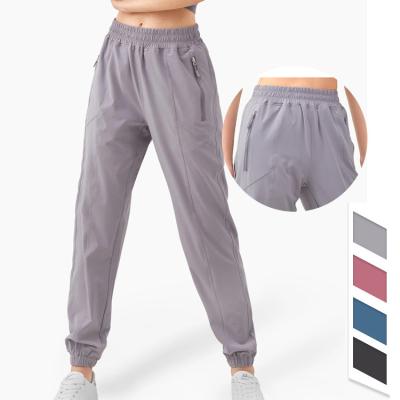 China 2020 Breathable Women High Waist High Quality Zipper Pockets Loose Style Quick Dry Fitness Workout Sports Yoga Pants for sale