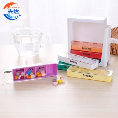 China Eco-friendly Weekly Pill Organizer Multicolor Optional Drawer Stacking Type 7-Color Plastic Medicine Box Packing Storage Box 3-Times-a-day 7-Day Pill Box for sale