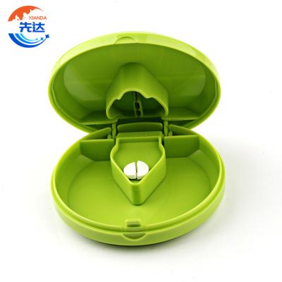 China Circular Cut Pill Drug Pill Box Pill Cutter With Container Dispenser Weekly Bulk Custom Medicine Storage PC12 for sale