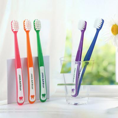 China Free sample promotional adult toothbrush OEM/ODM binchotan charcoal disposable stiffens professional toothbrush 2 in 1 for sale