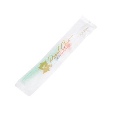 China Disposable plastic adult toothbrush and toothpaste inside disposable toothbrush wholesale for sale