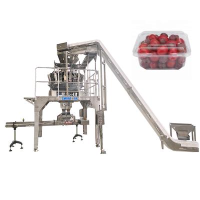 Китай High efficient automatic cherry tomato box packing machine kumquat cumquat clamshell packing line with 14 head balance weigher продается