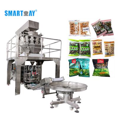 China High Quality Weighing Sealing 500g 1kg Sunflower Seed Grain Tea Leaves Food Filling Melon Seeds Automatic Food Packing Machine for sale