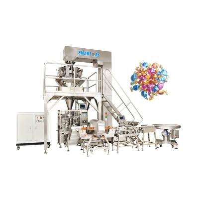 China VFFS Packaging Machine Small Dry Weigher Granule Biscuits Bag Packing Machine Smart Food Weigh Bag Packing Machine for sale