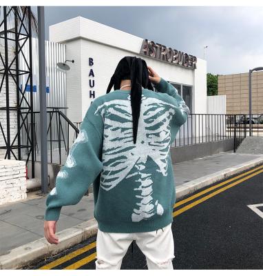 China Anti-wrinkle Hip Hop Streetwear Harajuku Knitted Sweater Skull Pattern Y2K Sweater Pullover for sale