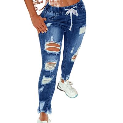 China Breathable Wholesale Blue Woman Distressed Pocketed Skinny Denim Ripped Jeans for sale