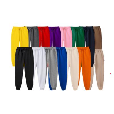 China Breathable Mens Fitness White Sports Pants Brushed Solid Color Mens Sports Pants Casual Pants for sale