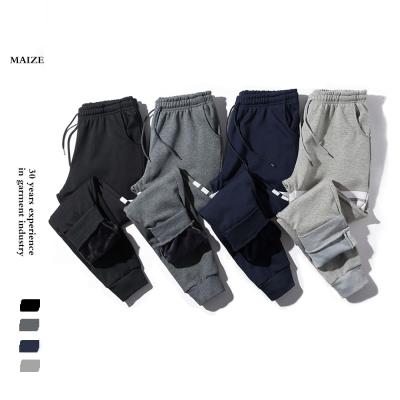 China New Anti-Static Full Body Cold Proof Keep Warm Lined Slacks Men Exercise Pants for sale