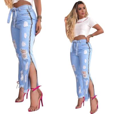 China Hot Selling QUICK DRY Ripped Women Jeans Pants Slimming Women Jeans Lace Up Split Pants With Pockets for sale