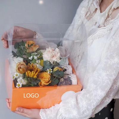 China Handmade luxury rose flower cake box pvc wedding valentine mother's day birthday party transparent gift box with handle for sale