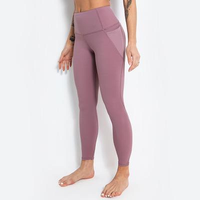 China Large size viable wholesale courses in Europe and plus size net yarn splice wear tight elastic buttocks movement pants yoga pants for sale