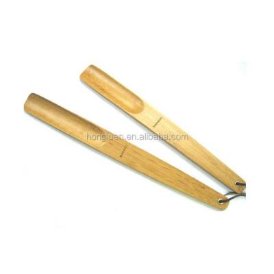 China Custom OEM Promotional Hotel Long Handled Bamboo Wooden Shoe Horn Eco - Friendly Manufacturing for sale