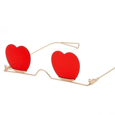 China Fashion GUVIVI Sunglasses Rimless Sunglasses New Shape Gradient Heart Glass Sunglasses Heart Sunglasses Wholesale for sale