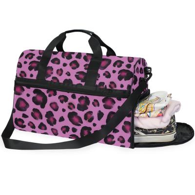 China Custom Large Capacity Leopard Sports Gym Duffle Bag Pink Women Foldable Custom Travel Bags With Shoe Compartment for sale