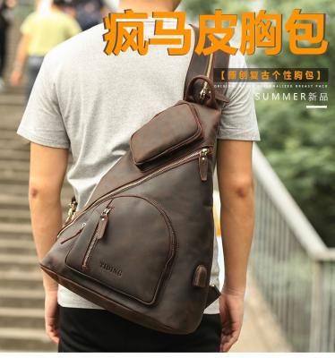 China Genuine Cow Leather Europe Men's Waterproof Backpack Fashion Outdoor Casual Waterproof Shoulder Bag for sale