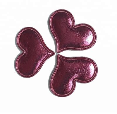 China hot sale 3D sew on accessories for garment heart shape PU leather padded applique for sale