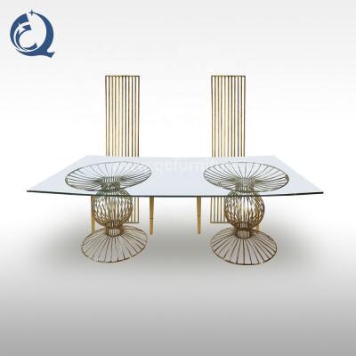 China New Gold Stainless Steel Stable Glass Top Base Wedding Table for sale