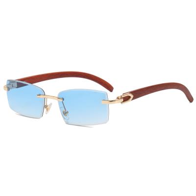 China 2022 Superhot Fashion Rimless Eyewear 15067 Retro Small Rectangle Sunglasses for sale