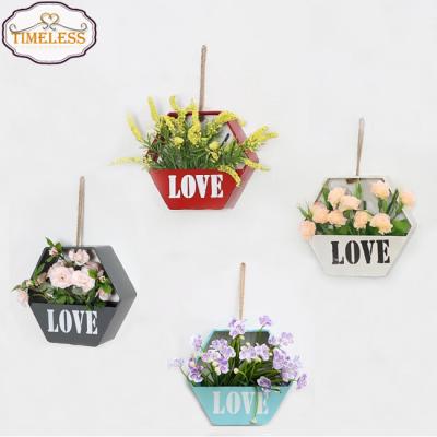 China 17x20x6cm Plant Hexagon Metal Flower Basket Wall Mounted Plant Pot Rack Directly for sale