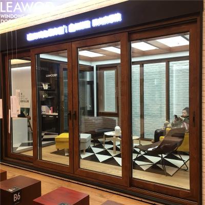 China CE ISO9001 LEAWOD Windproof Certificate KT145 Aluminum And Double Glazed Wooden Composite Sliding Door for sale