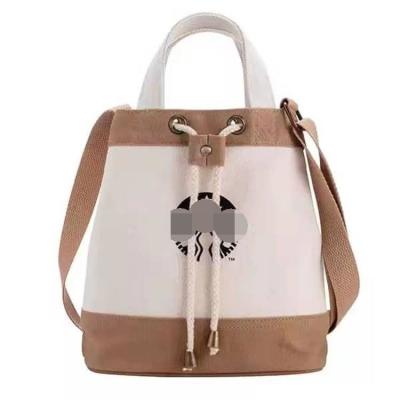 China 2022 High Quality AIZHU Simple Fashion ODM New Star Large Capacity Bar Guest Shoulder Drawstring Messenger Bag Wholesale for sale